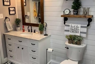 a bathroom with a toilet and a sink