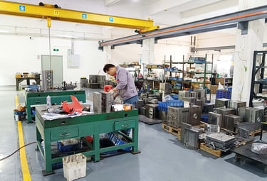 mould maker in metal mold workshop