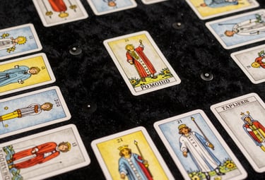 A collection of polished stones glowing softly with blue and golden light, arranged in a sacred circle.