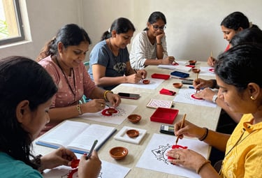 Participants crafting handmade items in a cozy workshop setting.