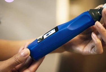 blue microneedling pen used for treatments