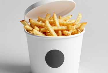 Variety of custom printed paper packaging boxes arranged on a clean surface.