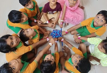 Joyful preschoolers in colorful outfits gathered around a pile of treats, celebrating friendship and