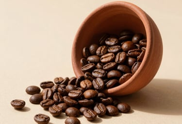 Product shot of specialty coffee beans spilling from a terracotta bowl onto a sand-colored surface, soft shadows, warm minimalist lighting.