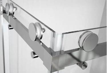 Close up of metal shower door rollers and track used in Auckland shower repairs