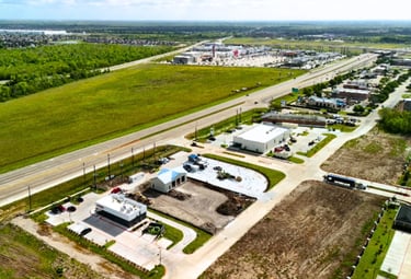 Aerial view of new businesses in a developing community