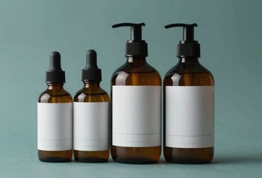 Luxury cosmetic bottles with minimalist labels on a clean teal background. Professional studio photography, soft lighting, Northern European aesthetic focusing on purity and quality.