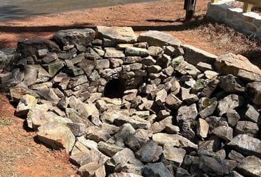 Culvert pipe stacked stone headwall