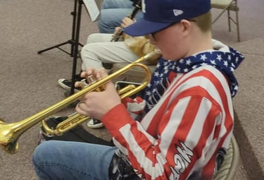 Tacoma Area Homeschool Band students playing in class 