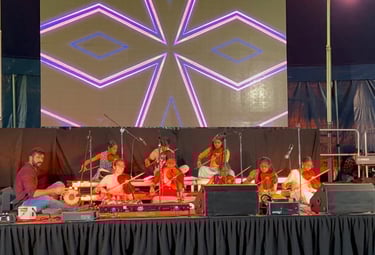 A picture of children ensemble performing at an event