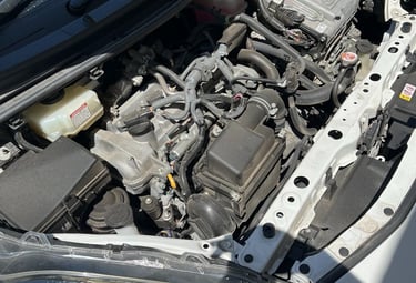 a car with a engine in the hood of a car