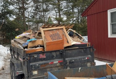 Removing large appliance from basement during junk removal job