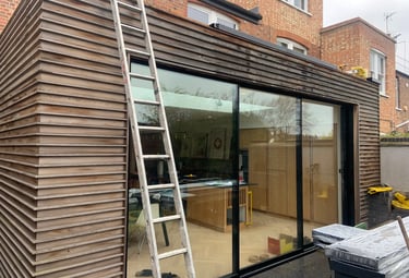Bespoke cedar wood cladding on a stunning extension specified by the client.