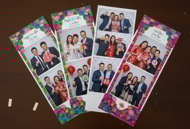 a group of people posing for a photo booth