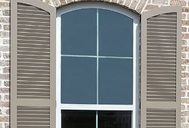 exterior shutter with an arched top