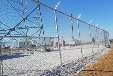 Commercial chain link fence with barbed wire installed for business security in Kentucky