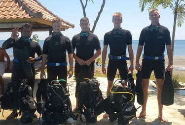 Students practicing diving skills at Lovina Reef with instructor, Sunrise Dive Bali