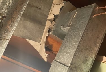 Furnace ducting with asbestos insulation
