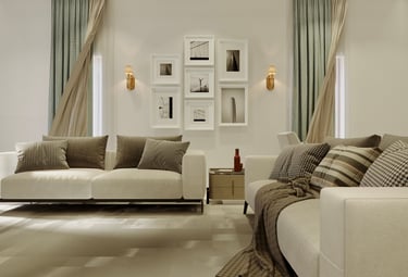 Modern living room with white sofas, elegant wall art gallery, and soft lighting.