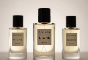 Close-up of hands holding a perfume bottle with Sicilian citrus fruits around.