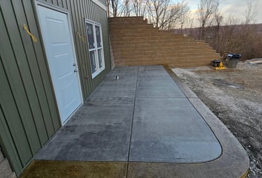 a concrete patio with a concrete patio with a concrete patio