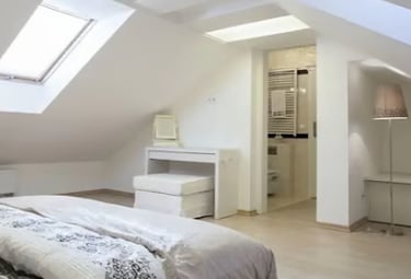 A bright, modern loft conversion transformed into a functional bedroom in Brighton. 