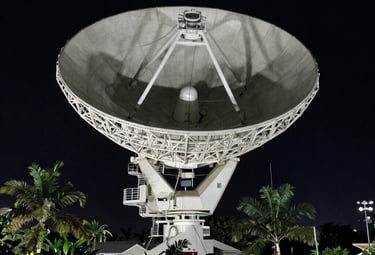 A large, realistic Mars planet glowing softly in space with distant sparkling stars.