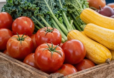 A vibrant, inviting market stall in a North American / US farmers market, showcasing a bountiful display of fresh, locally sourced produce. The composition features a close-up of a rustic wooden crate filled with a variety of colorful vegetables such as plump red tomatoes, deep green leafy kale, and golden yellow squash, all appearing fresh and wholesome. Bright, natural daylight softly illuminates the scene, creating gentle highlights on the produce. The style is authentic and clean, emphasizing the farm-to-table quality and community spirit.