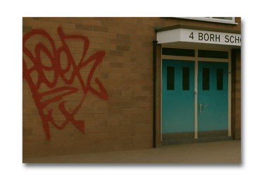 Graffiti removal from brick wall using laser surface cleaning technology