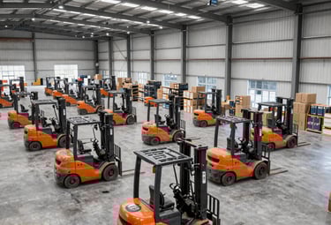 Two construction workers in hard hats and vests