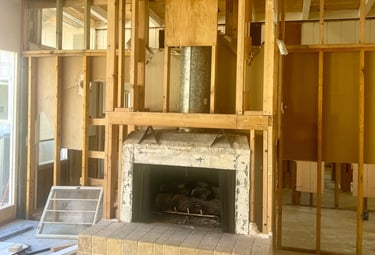 Custom electric fireplace installation with surround, hearth, and mantle — also offered as gas firep