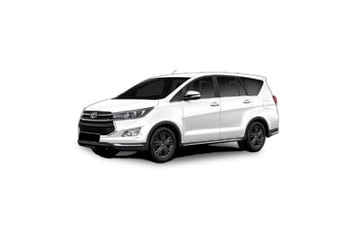 a white Toyota Innova car parked on a white background