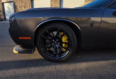 wheel showing a customized, freshly painted brake caliper by bluemax tint