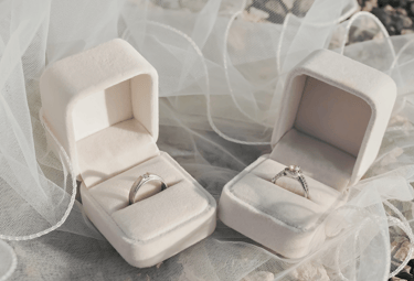 a couple of wedding rings with a wedding ring