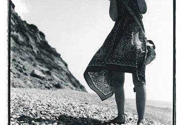 Woman on the beach, an analogue black and white picture. Portrait photography.  Author: Slawek Dejneka
