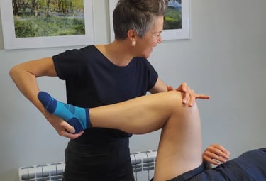 Therapist giving treatment for hip pain
