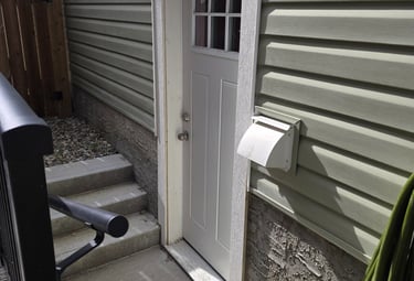 Separate entry basement egress with concrete work and drainage installed.