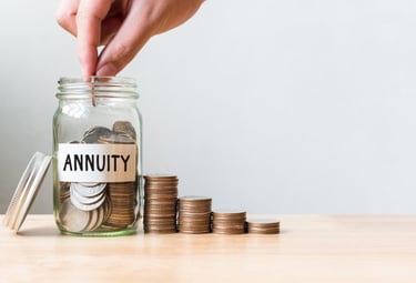 a person putting coins into a jar of coins
