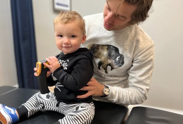chiropractor working with toddler motor delays near Franklin