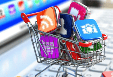 Un carrito de compras con diferentes redes sociales