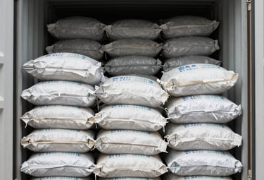 Close-up of fresh spices and pulses neatly packed for export.