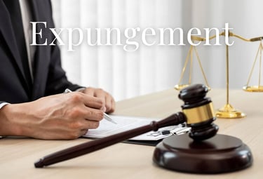 a man in a suit and tie is writing on a paper -  KamBri Solutions