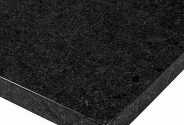 Professional studio photography of a polished black granite slab with subtle golden sparkles, high-contrast lighting reflecting the smooth premium surface.