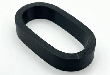 Skilled technician bending and shaping sheet metal in a bright workshop.