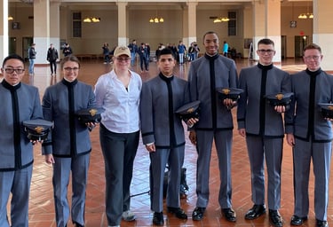 Dr. Hooton, center, with West Point students on a tour at Ellis Island