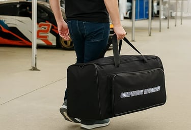 Person carrying a bag full of racing gear