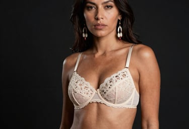 Luxury modeling photography featuring a striking woman posing elegantly. Ambient fog, glowing purple and magenta rim lights, high-end adult website editorial aesthetic, Latin American / Global style.