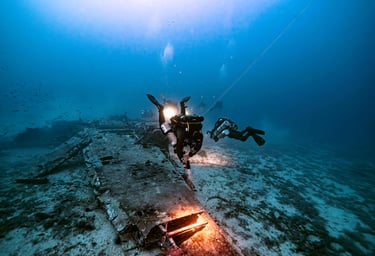 technical divers exploring a plane wreck in Malta. Damian Xuereb is the diver using a CCR rebreather
