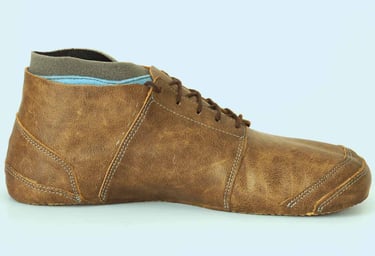 foot shaped leather shoes