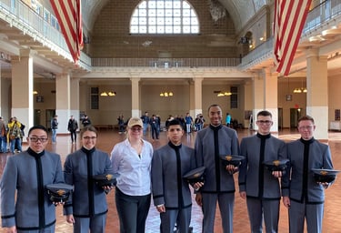 Dr. Hooton, center, with West Point students on a tour at Ellis Island